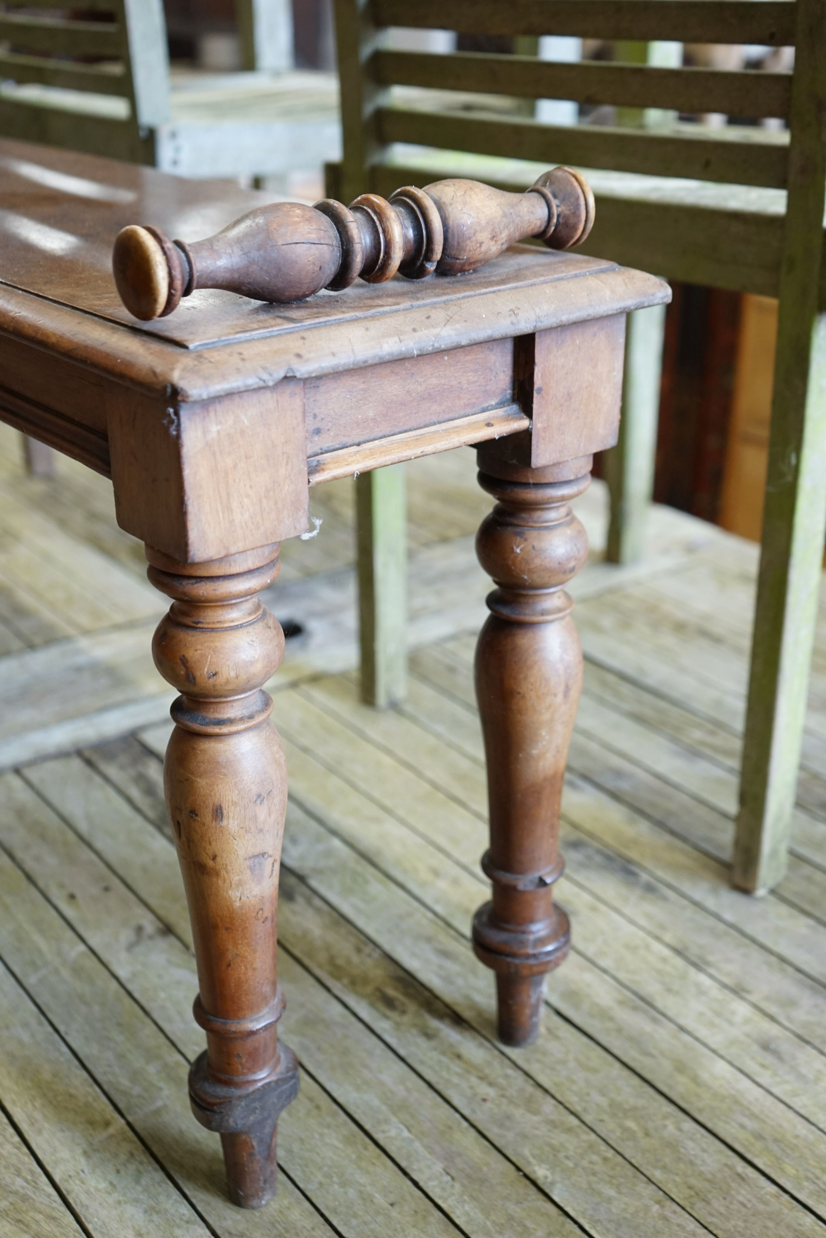 A Victorian mahogany window seat, length 122cm, depth 28cm, height 50cm